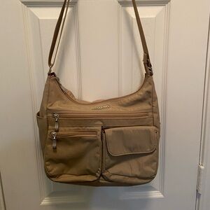 Bagallini tan crossbody bag with 2 front pockets interior card slots and pocket